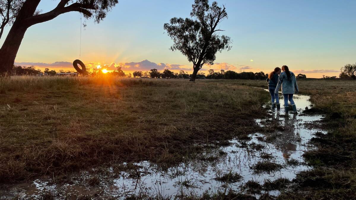 WET, COLD, WINDY WEEKEND: It's been a wetter than average July in Parkes and the weekend was no exception, with plenty of puddles for kids to play in. Photo: RENEE POWELL.