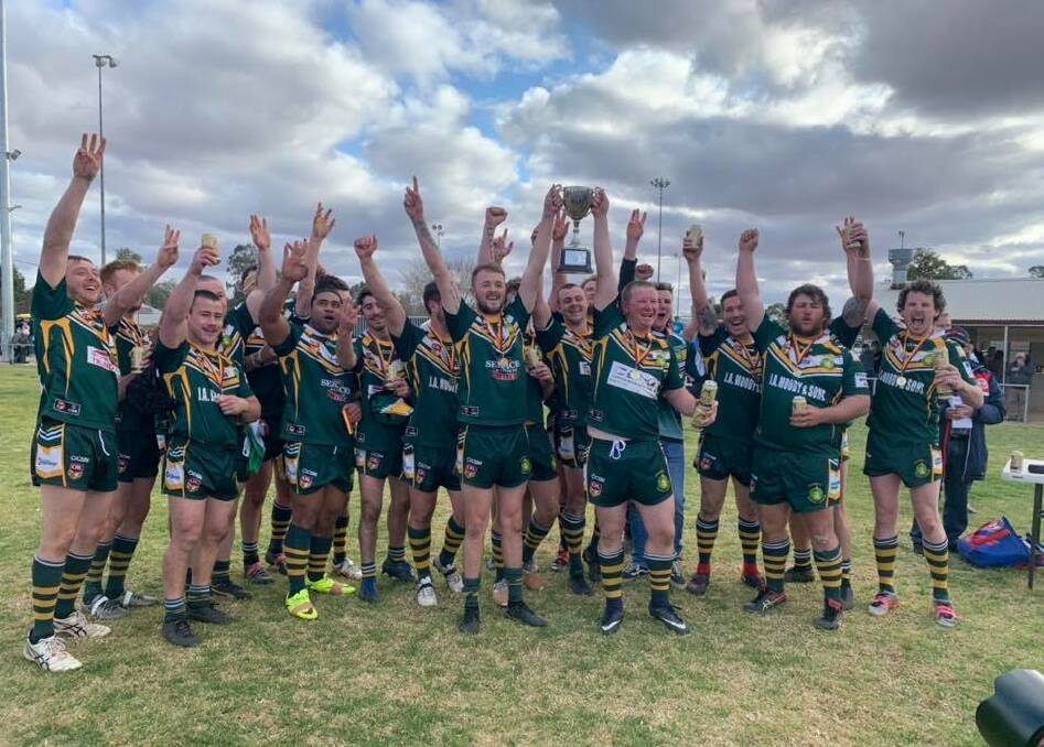 The Trundle Boomers celebrate their win over Manildra in the Woodbridge Cup grand final.