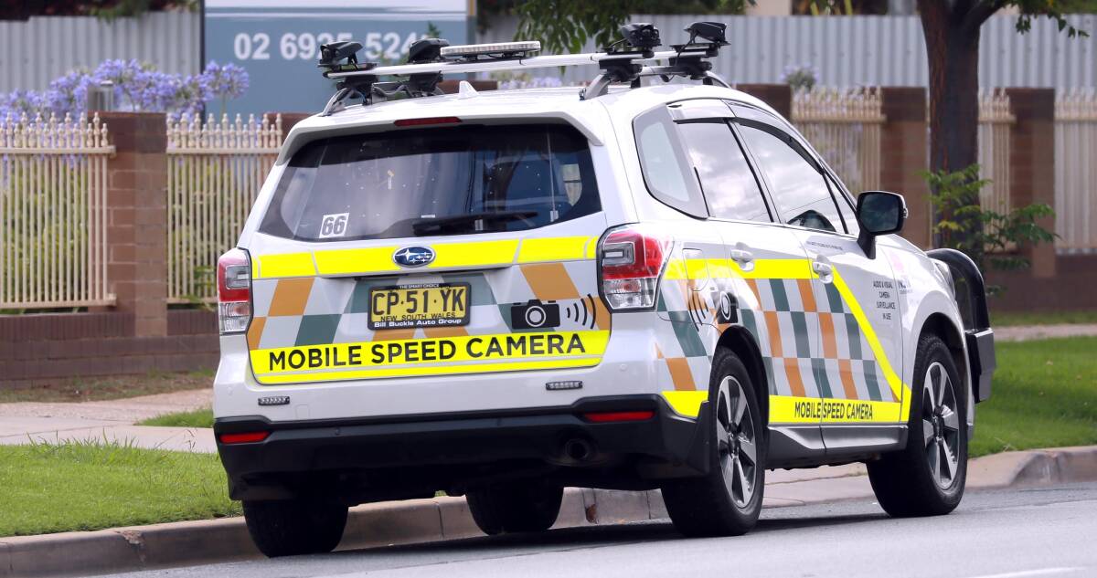 BOLD COLOURS AND SIGNAGE TO GO: Mobile speed cameras are expected to lose their colourful signage in the coming months. Photo: Les Smith