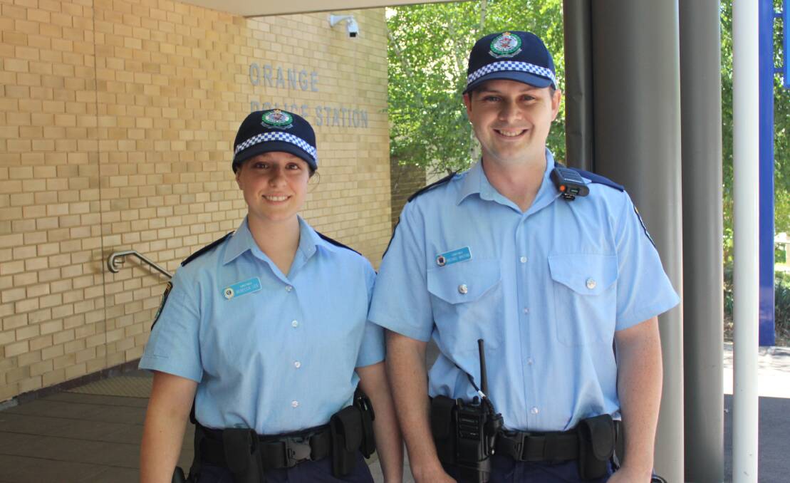 FRESH FACES: Probationary Constables Rebecca Lee and Mick Whiting outside Orange Police Station on their first day on the job. Photo: MAX STAINKAMPH