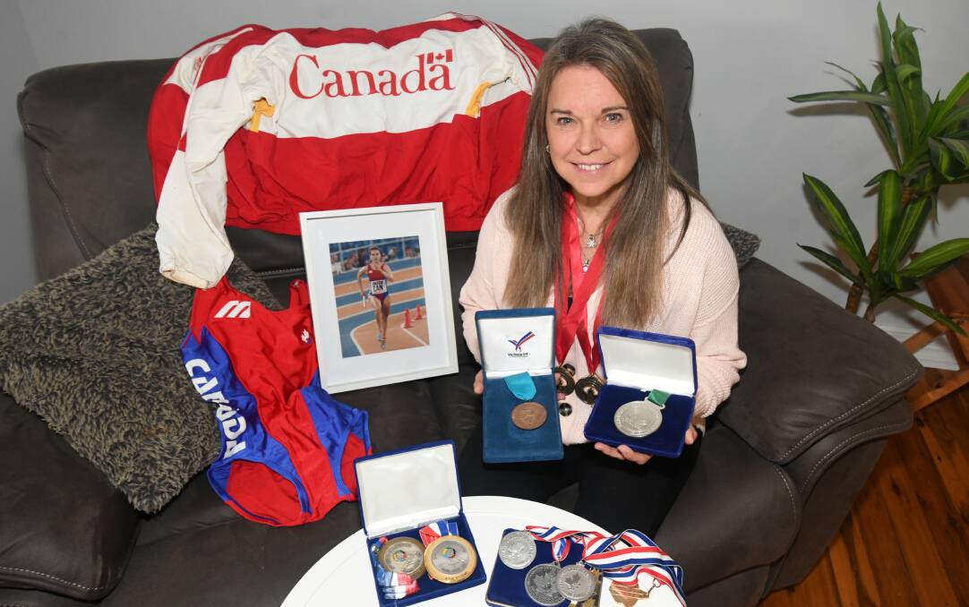 STORIED LIFE: Alanna Hinrichsen picked up countless medals and memorabilia during her track career representing Canada. Now she calls Orange her home. Photo: CARLA FREEDMAN.