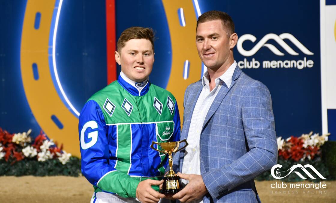 UPSET WIN: Joshua Gallagher and Jason Grimson celebrate their Inter Dominion Pacing Championship triumph on Saturday night after Boncel Benjamin won in a protest against Expensive Ego. Photo: CLUB MENANGLE