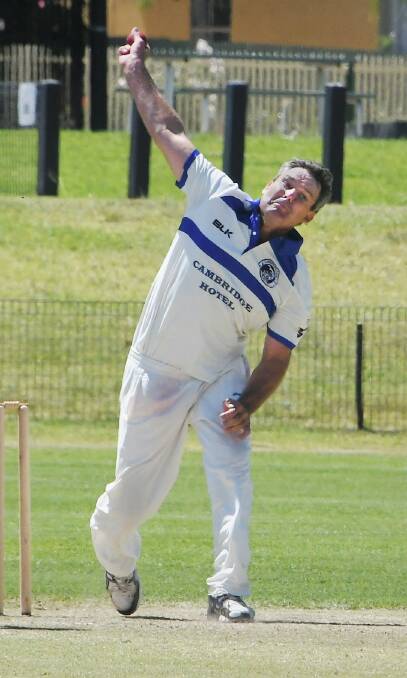 HUGE HONOUR: Clinton Hawke, pictured bowling for the Cats in Lachlan Premier Cricket, has been awarded Life Membership of the Parkes District Junior Cricket Association. Photo: JENNY KINGHAM.