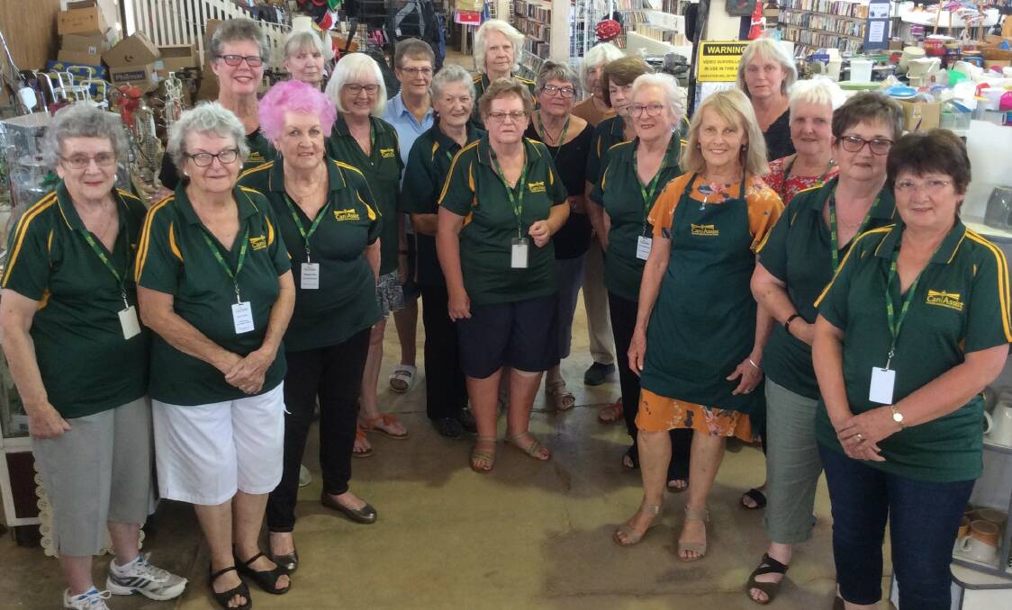 HARD WORKING: Some of the amazing Can Assist volunteers at their last garage sale at the Parkes Showground. Photo: Supplied.