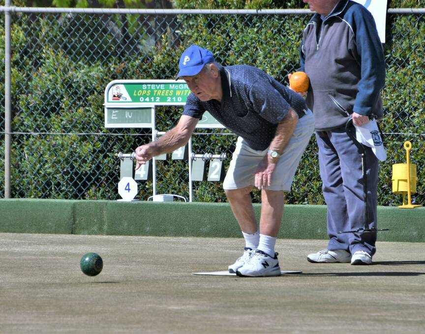 ROCKING AND ROLLING: John Carr sends one down at the Parkes Bowling and Sports Club. It has been glorious weather for all our bowlers in Parkes of late. Photo: JENNY KINGHAM.