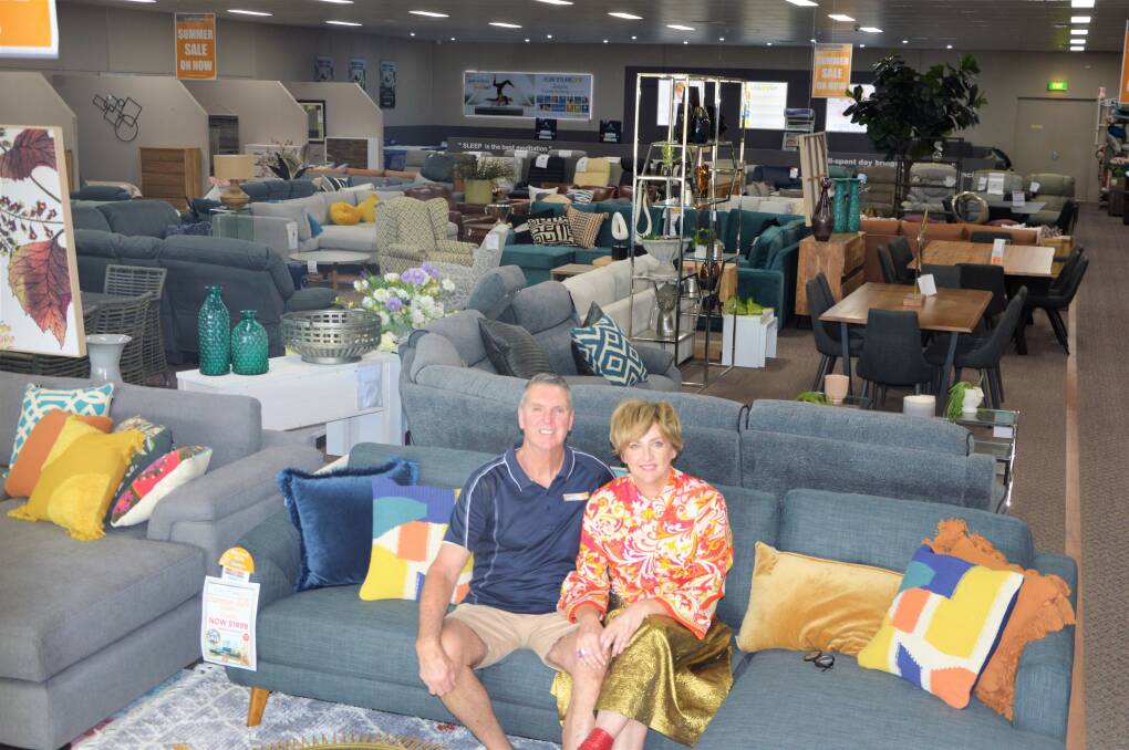 SALE: John and Karen Creith with some of their incredible range. The much-adored community members are retiring and closing down their store. Photo: KRISTY WILLIAMS.