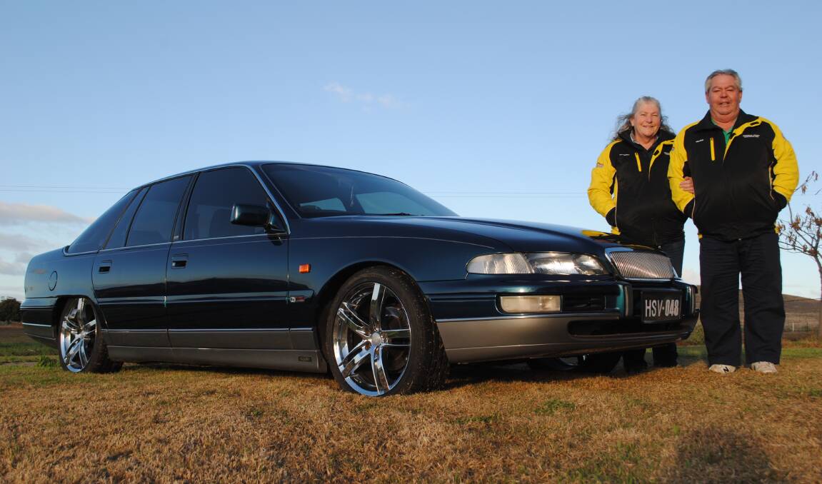 SMOOTH MOVER: Christine and Warick Miskell with their 1995 Holden HSV VS Statesman. It has a 304 cubic inch V8, 4 speed auto, full leather interior and 18 inch rims. What a beauty. Photo: JEFF MCCLURG.