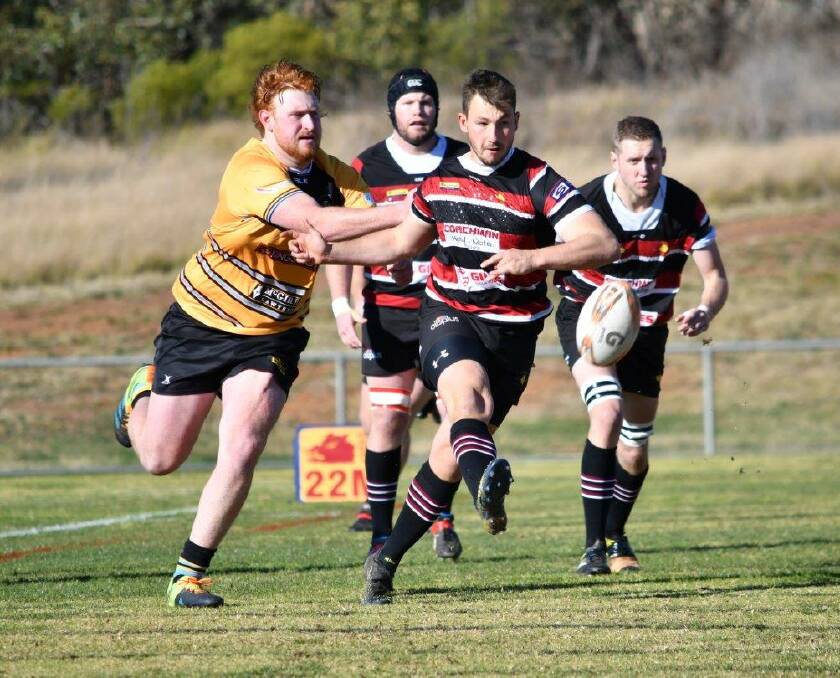BRINGING IT HOME: The Parkes Boars will host their first grand final after 54 years, and flyhalf Luke Bevan was once again crucial in the win. Photo: ALLAN RYAN.