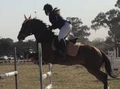 WHAT A PAIR: Jorja Rusten and Shadow, her trusty show jumping stead, will be heading to the Sydney Royal Easter Show next week. Photo: SUPPLIED.