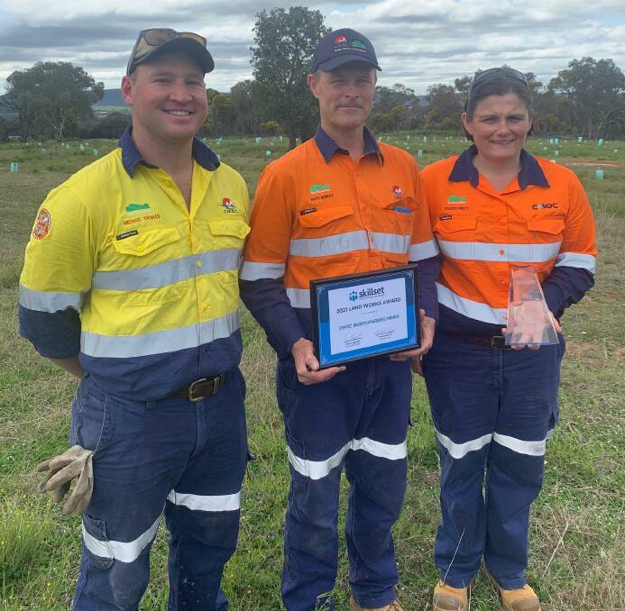 ALL SMILES: Michael Thomas, Matt Burkitt and Stacey Kelly from CMOC-Northparkes Mine, who were 2021 Skillset Land Works Award winners. Photo: SUPPLIED.