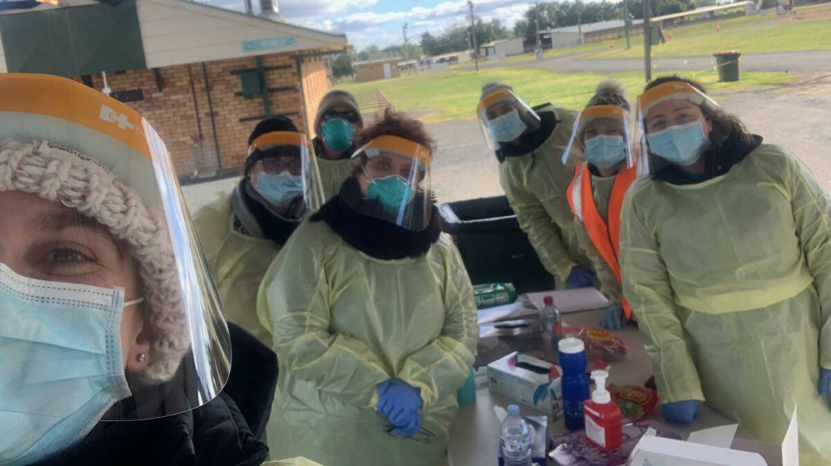 ON THE FRONT LINE: Health professionals at the drive-through COVID-19 testing site at the Parkes Showground on Wednesday. Photo: SUPPLIED.