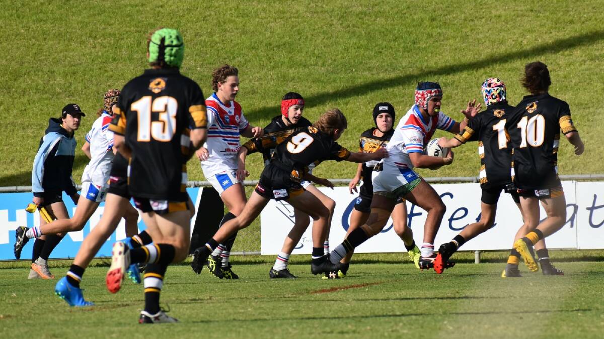 BIG EFFORT: The Parkes under 16's (pictured playing against Grenfell in round 3) had a good win against Molong last Saturday. Photo: Julie Herring.