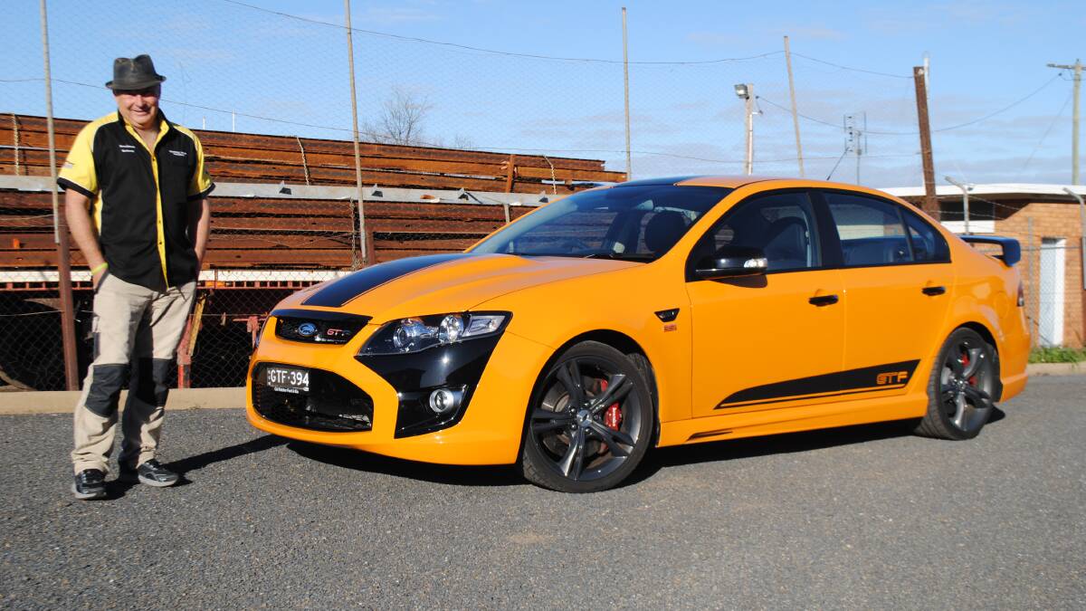 THE OPULENT ORANGE FORD: Rodney Barnes is pretty proud of his 2014 Ford FG FPV GTF 351. Photo: SUPPLIED.