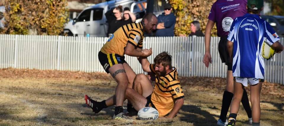 TRY TIME: Jordan Kennedy and Yarangirri Holmes celebrate a try against Molong last weekend. Photo: Eugowra Golden Eagles Facebook.