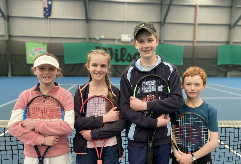 BUDDING TENNIS SUPERSTARS: Anna Orr, Sienna Hunt, Ethan Hunt and Lachlan Orr competed at the Orange Indoor JUS in the holidays. The Parkes event is on August 15. It's a hive of activity at the Parkes Tennis Centre at the moment. Photo: SUPPLIED.