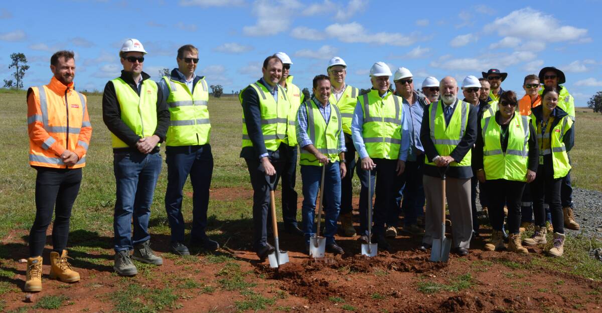 READY TO ROLL UP THE SLEEVES: Georgiou Group workers at Monday morning's sod turn for the Parkes Bypass project. Photo: KRISTY WILLIAMS.
