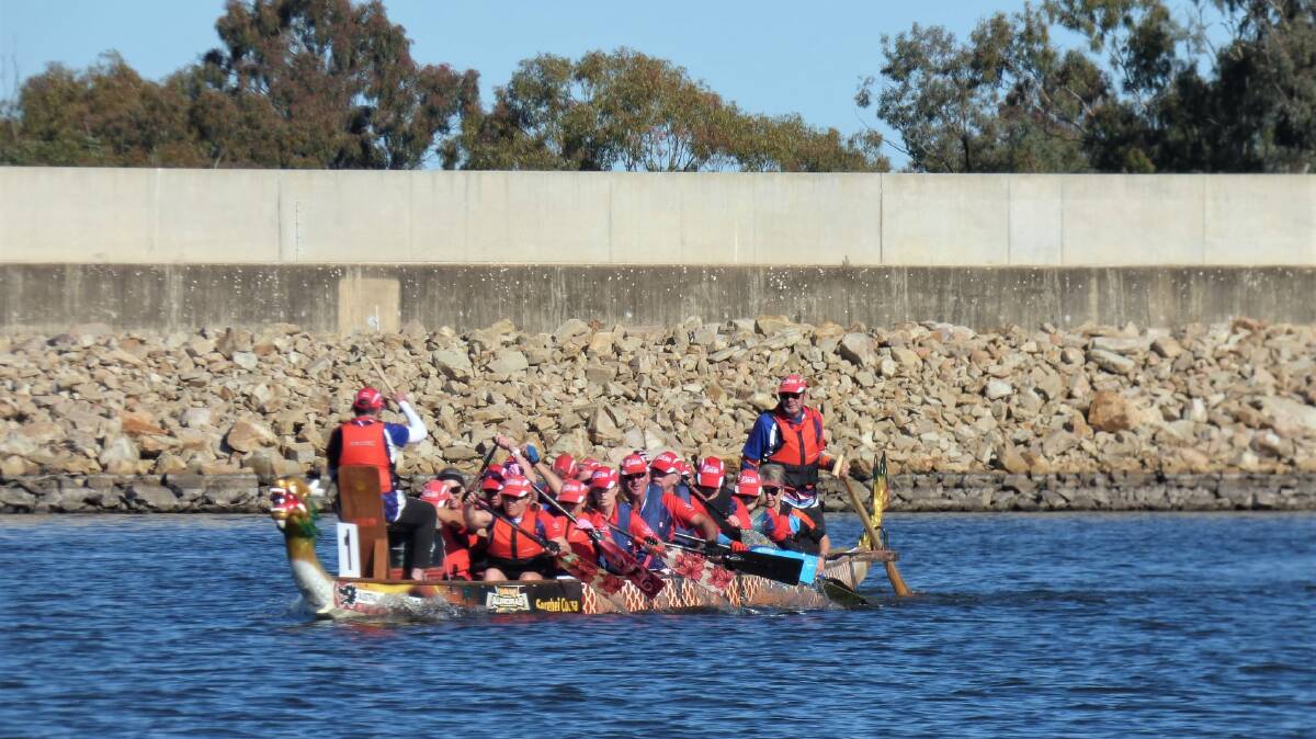 WHAT A DAY FOR A PADDLE: Parkes takes to the water as part of the three year anniversary of the Parkes Dragon Boat Club conception. Photo: PDBC Facebook.