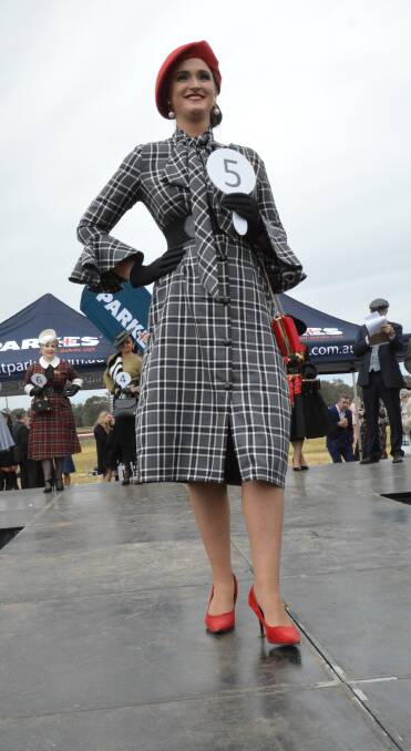 ELEGANT AND CONTEMPORARY: Kirsty Colliver of Dubbo was an entrant in the 2019 Fashions on the Field with this pattern and pop of colour.