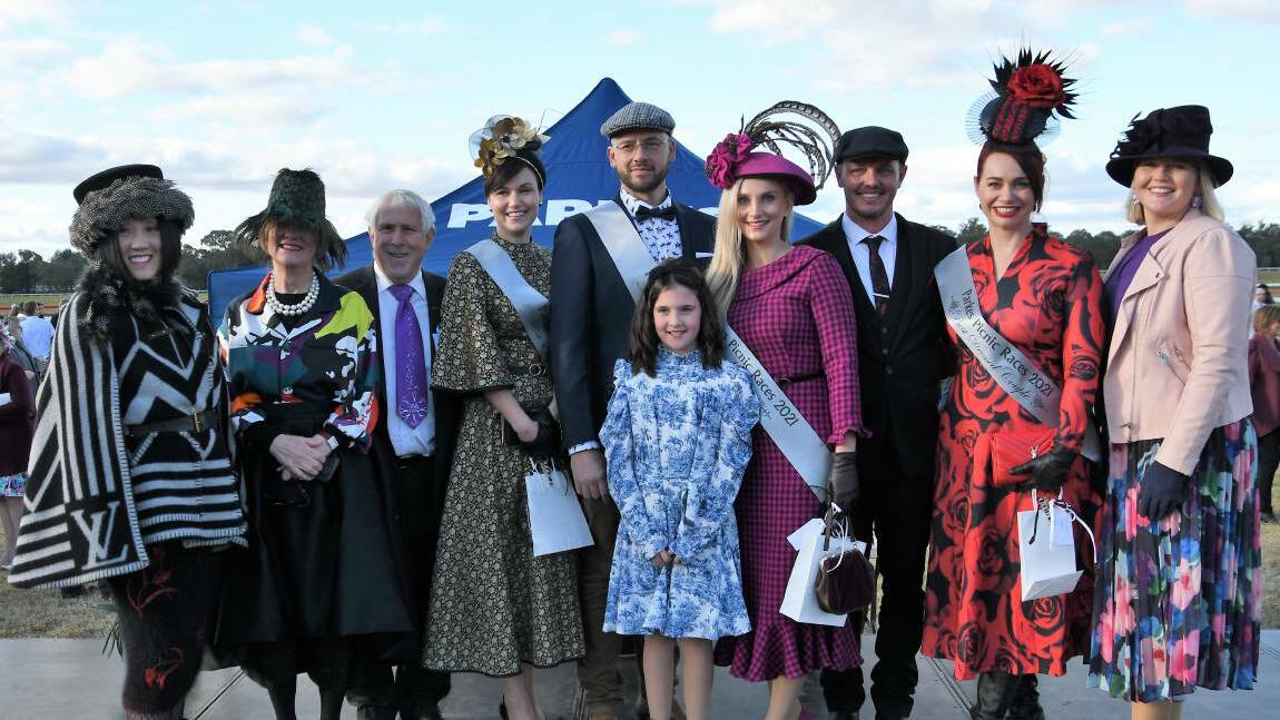 A GREAT DAY OUT: The Fashions on the Field (pictured is the 2021 winners and the judges) is always a highlight of the Parkes Picnic Races. Photo: JENNY KINGHAM.