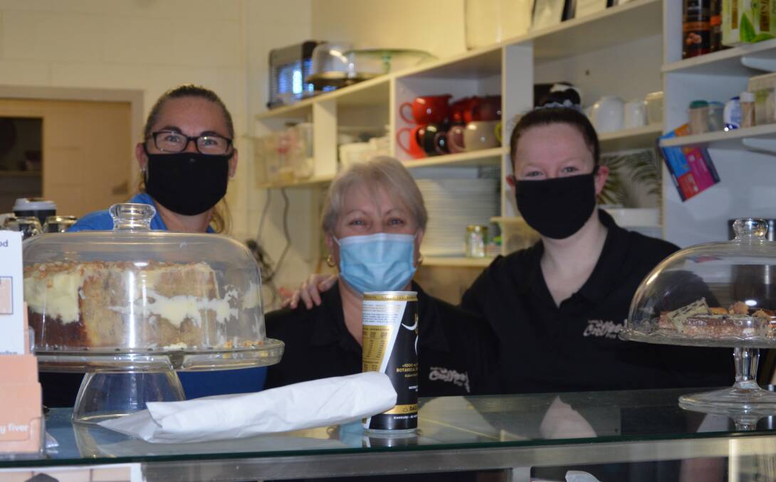 USE YOUR VOUCHERS: Tracy Tonkin, Leanne Feild and Cordelia Moon at the Coffee Pot in Parkes, which accepts D & D. Photo: KRISTY WILLIAMS.