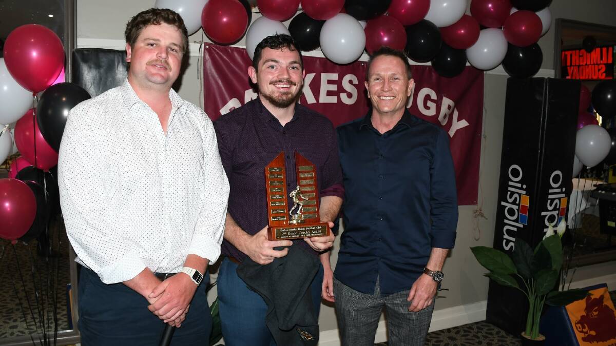 PROUD BOAR: Jacob Cass receiving the Second Grade Coaches Award in 2021 from Cooper Byrnes (left) and Anthony Stewart (right). Photo: ALLAN RYAN.