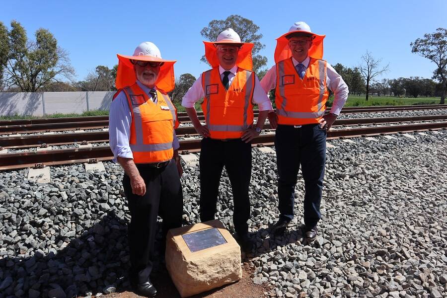 MOMENTOUS DAY: Ken Keith, Michael McCormack and Mark Coulton with the plaque commemorating the finish of the Parkes - Narromine track. Photo: Supplied. 