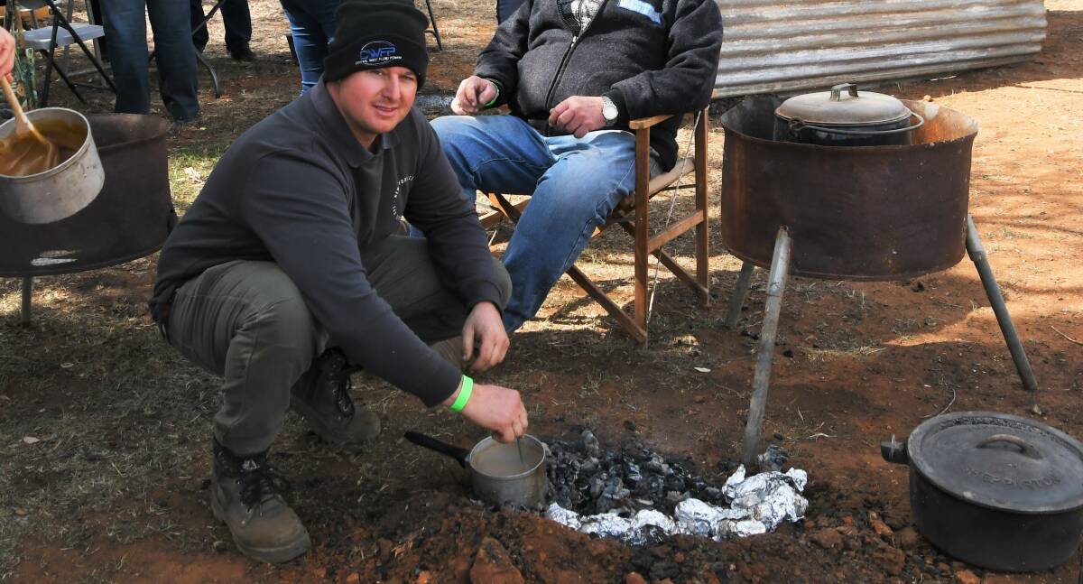 NO TUCKER DAY FOR TRUNDLE: Josh Morrison cooking up a storm at the 2019 Trundle Bush Tucker Day. Unfortunately this year's has been cancelled. Photo: JENNY KINGHAM.