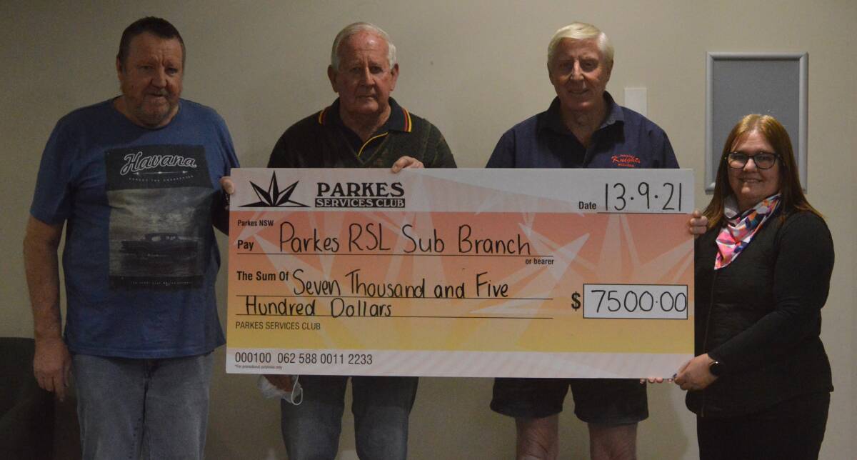 SPLASHING THE CASH: Mike Phillips and Cindi-Lee Murphy from Parkes Services with RSL vice presidents Robert Brook and Ray Knights.