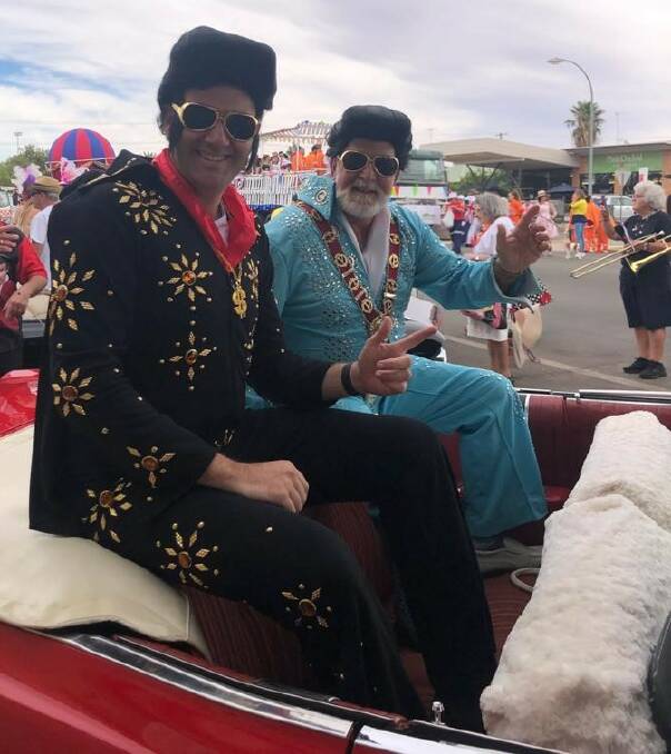 BIG HUNKS OF BURNING LOVE: Sam Farraway MLC and Parkes Mayor, Cr Ken Keith OAM, at the 2019 Elvis Festival's street parade. The 2022 festivals promises to be bigger and better than ever. Photo: SUPPLIED.
