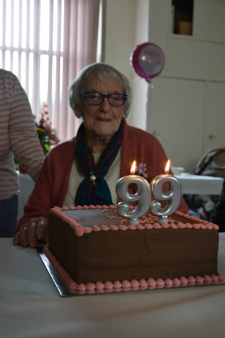 BIRTHDAY GIRL: Parkes resident Mary Johnson celebrated her 99th birthday on Saturday with family, friends and a delicious chocolate cake. Photo: KRISTY WILLIAMS.