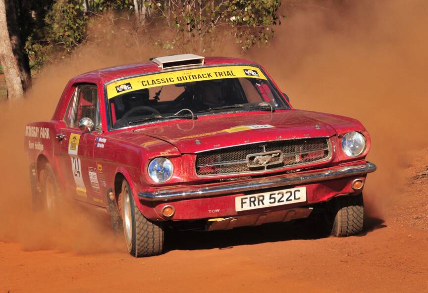 RED GOES FASTER: UK-based Kiwi Warren Briggs' eye-catching 1965 Red Mustang is having one last tilt at the Classic Outback Trial, which is starting in Parkes this week after a COVID-enforced break. Photo: SUPPLIED.