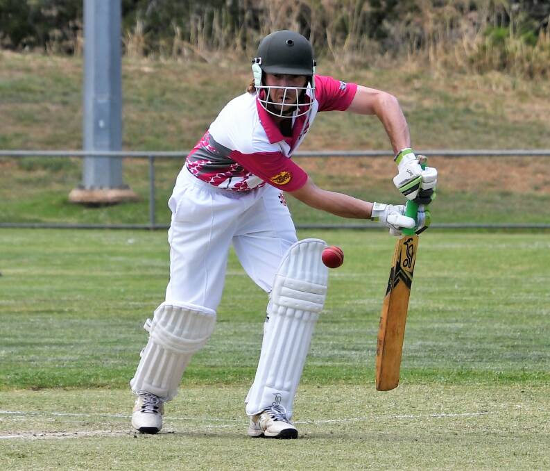 SOFT HANDS: Nicholas Parker defends one for the Parkes Hotel Galahs in their game against the Parkes Crushers.