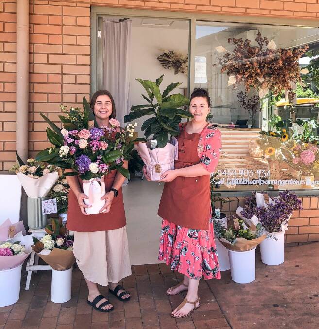 ABSOLUTELY STUNNING: Rani and Dimity Ross out the front of their newly-opened store, Little Blooms Arrangements near Big W in Parkes. Photo: SUPPLIED.
