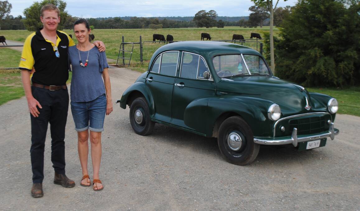 GREEN WITH ENVY: Andrew and Beth McIntyre with their British classic, a 1953 Morris Minor. It might not be fast but it is a little green beauty for a great Sunday drive. You'll definitely find it in the slow lane. Photo: SUPPLIED. 