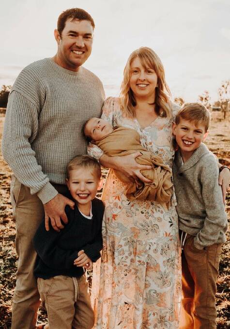 NEW ADDITION: Rachel, holding baby Flynn, and Mathew Swindle with sons Jacob and Ryan. What a beautiful family. Photo: TAMIKA MURRAY PHOTOGRAPHY.