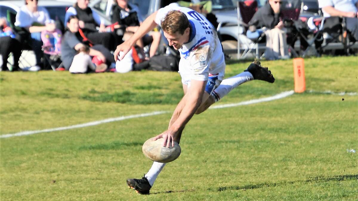 STEPPING UP: Jack Creith scores for Parkes in what turned out to be the last game of the 2021 season for the Spacemen, a 38-22 twin town derby win over Forbes. Photo: JENNY KINGHAM. 