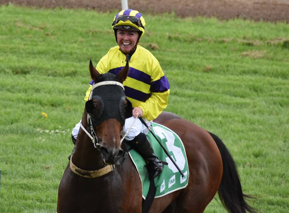 ALL SMILES: Parkes jockey Tiffany Prout was pretty happy as she returned to the mounting yard on Saturday after winning aboard If You Say So. Photo: ANDREW FISHER.