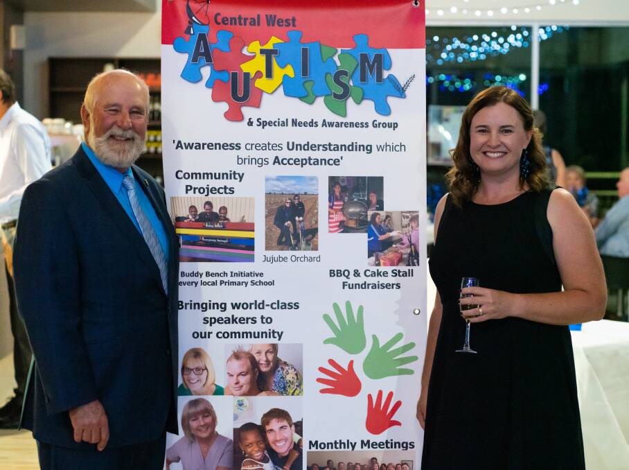 Cr Ken Keith OAM, Mayor of Parkes and Angela Wilson, President of the Central West Autism & Special Needs Awareness Group, at last years Blue Dish fundraiser.