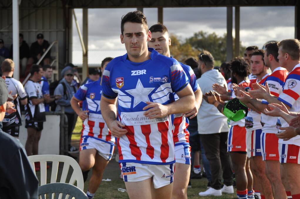 2021 FIXTURE RELEASED: Chad Porter leads the Spacemen out in the traditional long weekend derby clash against Forbes in 2019. Photo: Nick McGrath. 