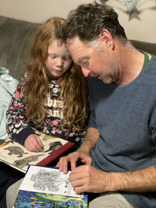 KEEPING HAPPY AND HEALTHY IN LOCKDOWN: Isabelle and Kevin Powell do some drawing at home to keep themselves occupied in lockdown. Photo: RENEE POWELL.