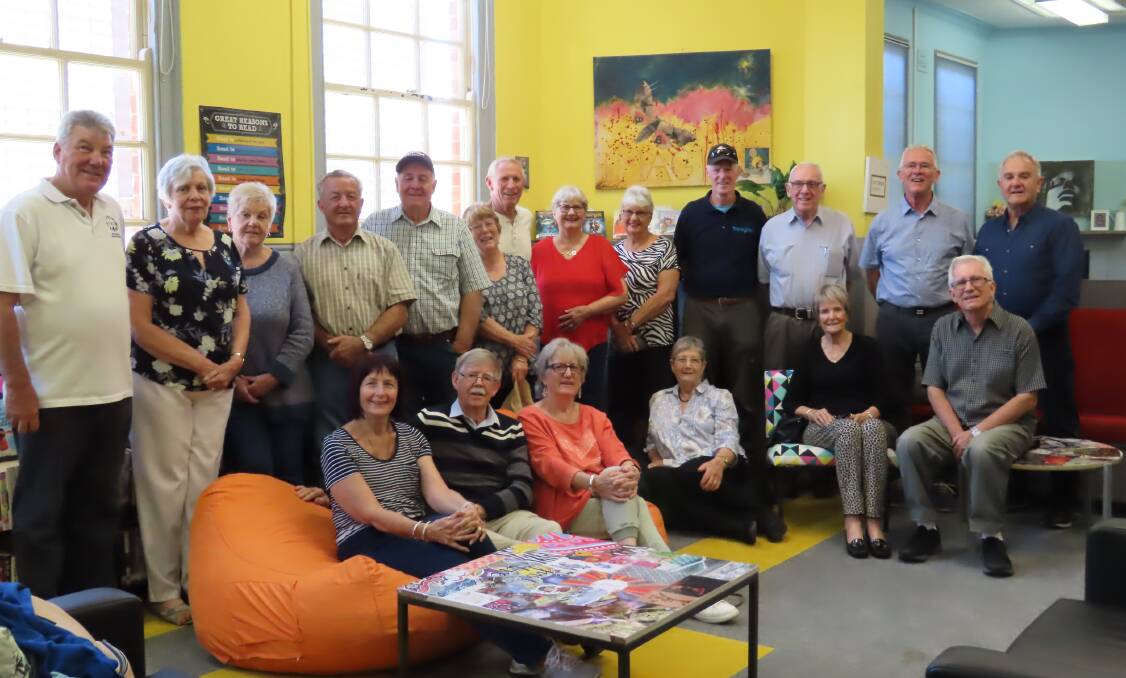 A very relaxed group of Parkes High ex-students pictured in the school library during their reunion visit.