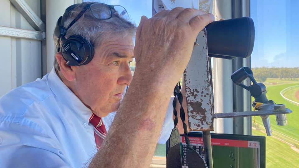 LIKE A FINE RED WINE: Col Hodges calling at Warren on Saturday, his 50th anniversary of race calling. Photo: Racing NSW.