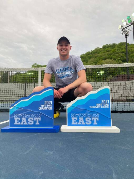 KILLING IT: Bogan Gate's Jake Magill, who now lives in West Virginia in the USA, with a couple of the MEC men's tennis trophies. Well done Jake!