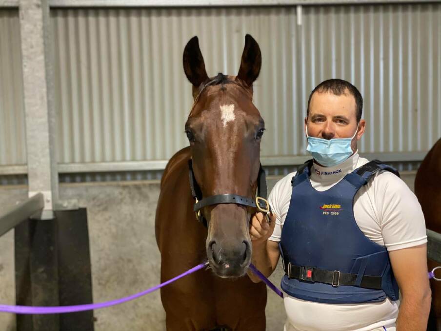 BATHURST WINNER: Caribbean Pat with Brett Hutchings after her victory on Friday night. It was the mare's second win in 34 career starts for the Parkes based Malcolm Hutchings stable. Photo: Bathurst Harness Racing Club Facebook.