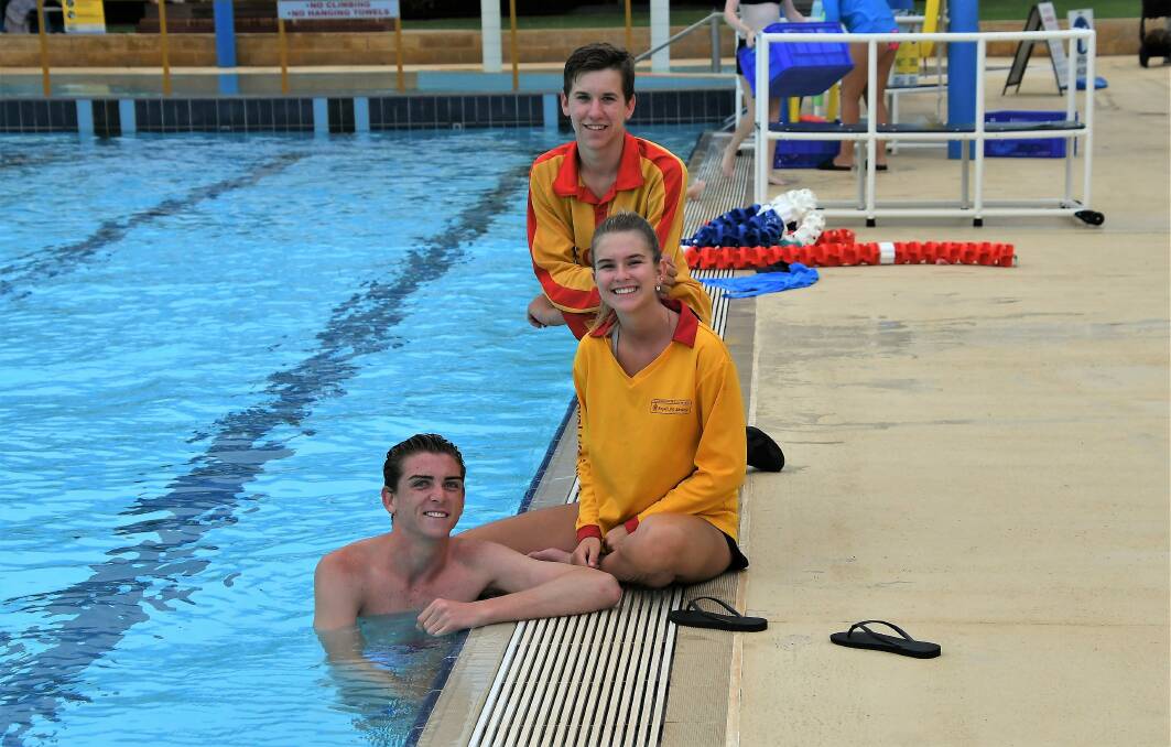 MAKING A SPLASH: Lifeguards Nicayden Greenwood, Nic Job and Phoebe Thompson organised a family fun night at the pool earlier this year. Photo: Jenny Kingham.