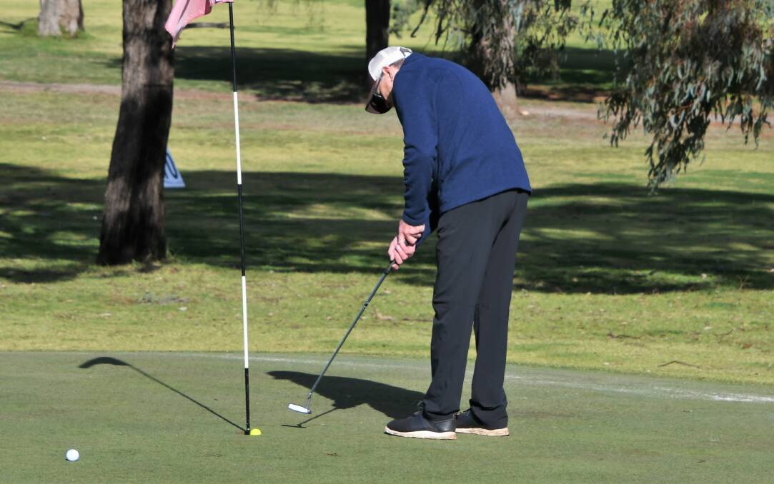 TOO GOOD: Tony Hendry, pictured here sinking a putt, has been on fire at the Parkes Golf Club recently with a couple of big wins. Photo: JENNY KINGHAM.