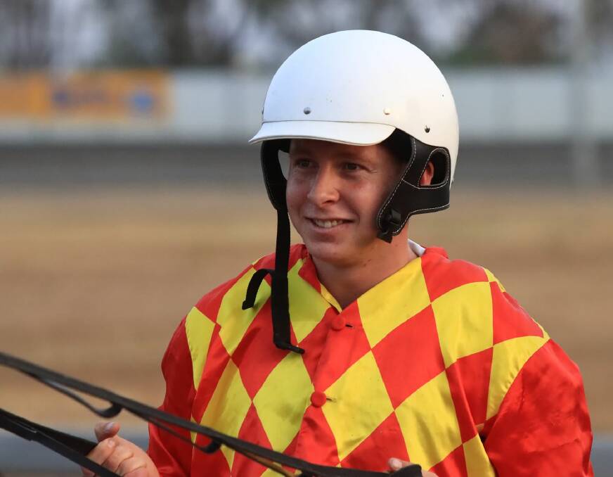 FIRST WIN: Blake Medlyn of Parkes after winning on Caribbean Jack at the Parkes Harness Racing Club's Elvis Festival meeting on January 8. Photo: COFFEE PHOTOGRAPHY & FRAMING