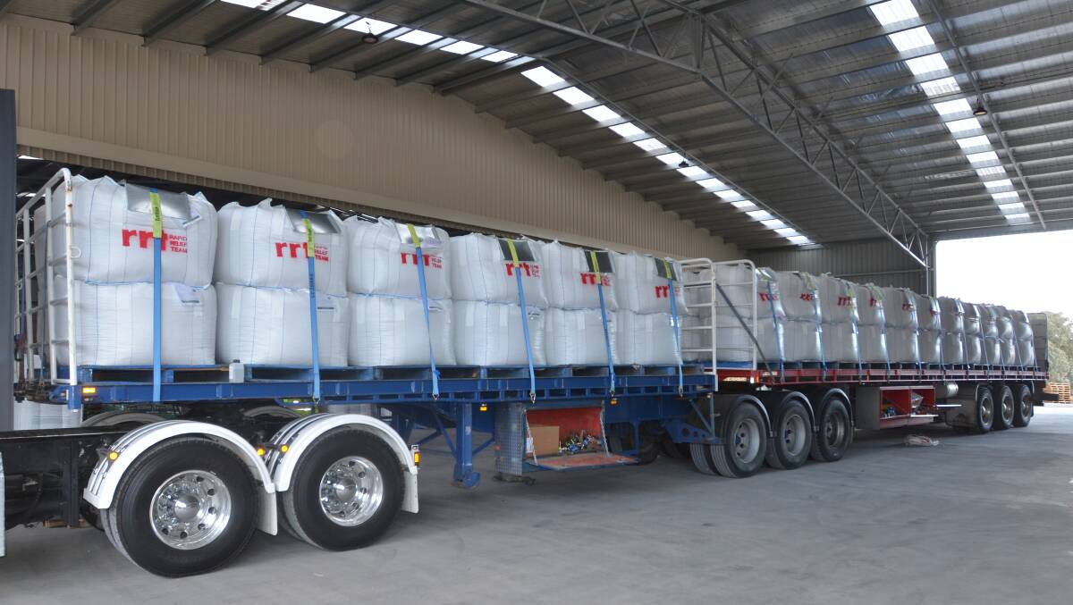 500kg bulker-bags of livestock supplement being shipped out of Ambos Stockfeeds on Monday afternoon.