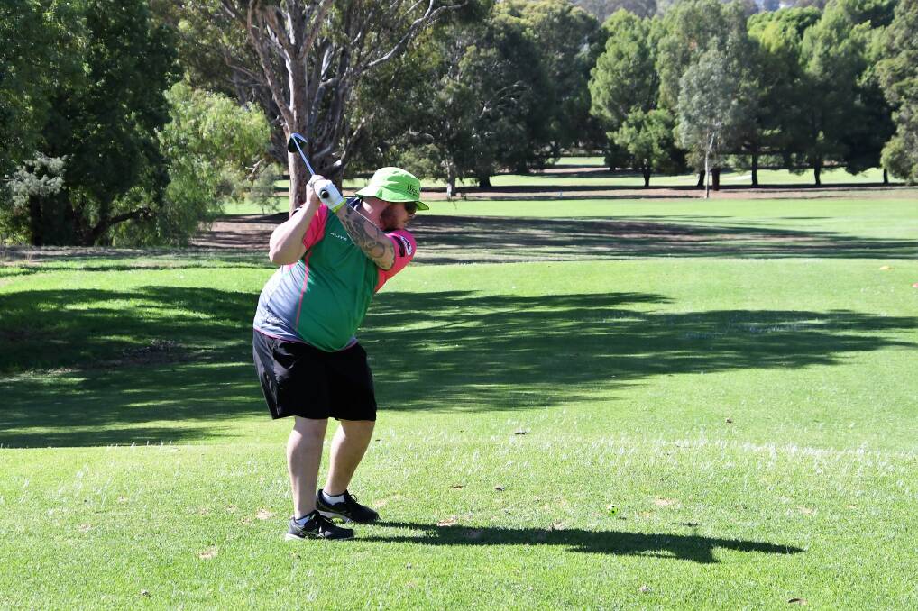 BIG HIT: Hayden Williams was among the many golfers to take part in the 11th annual Parkes Rotary Golf Day at the Parkes Golf Club this month. Photo: Jenny Kingham