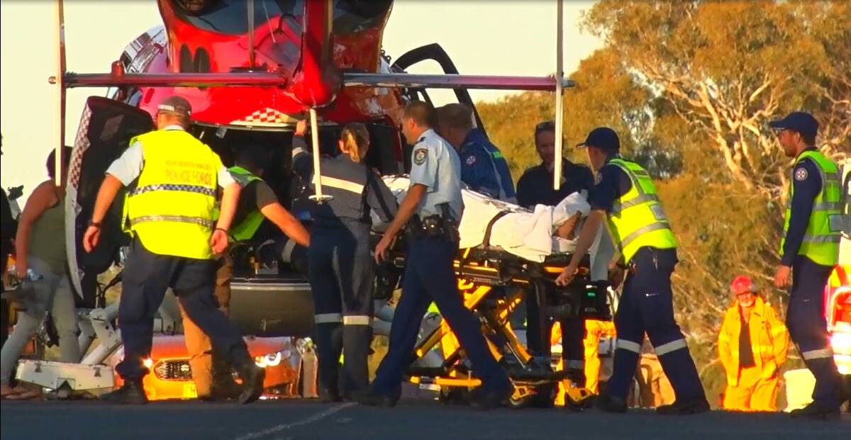 Close call: A 44-year-old man and his son were airlifted to Sydney hospitals with injuries sustained in the crash. Photo: TOP NOTCH VIDEO